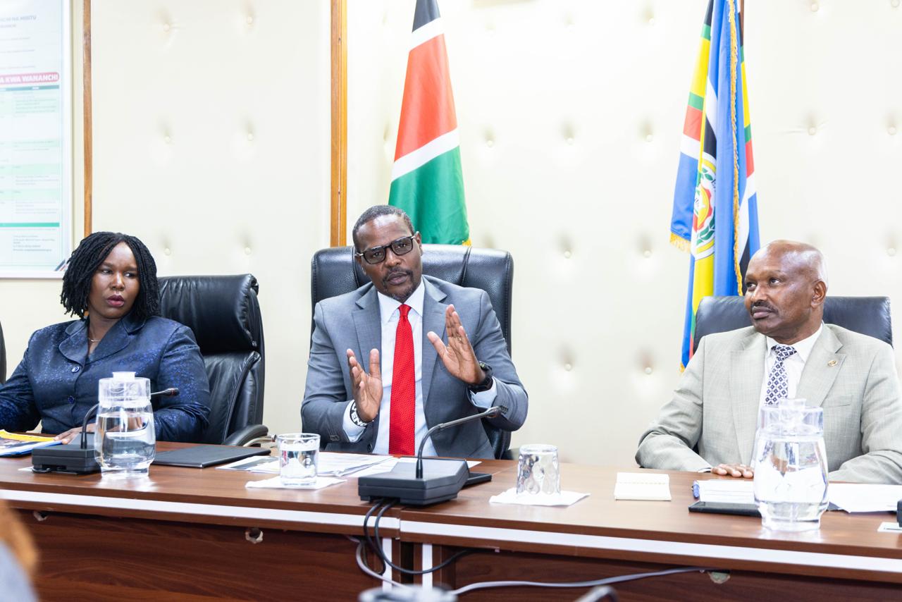 The Principal Secretary for Environment and Climate Change, Dr. Eng. Festus K. Ng’eno, MIEK, CBS, flanked by Environment Secretary Dr. Selly Kimosop and Secretary Administration Dr. John Korir, addresses Heads of Departments (HODs) during the signing of the Performance Contracts for the Financial Year 2026/2027.